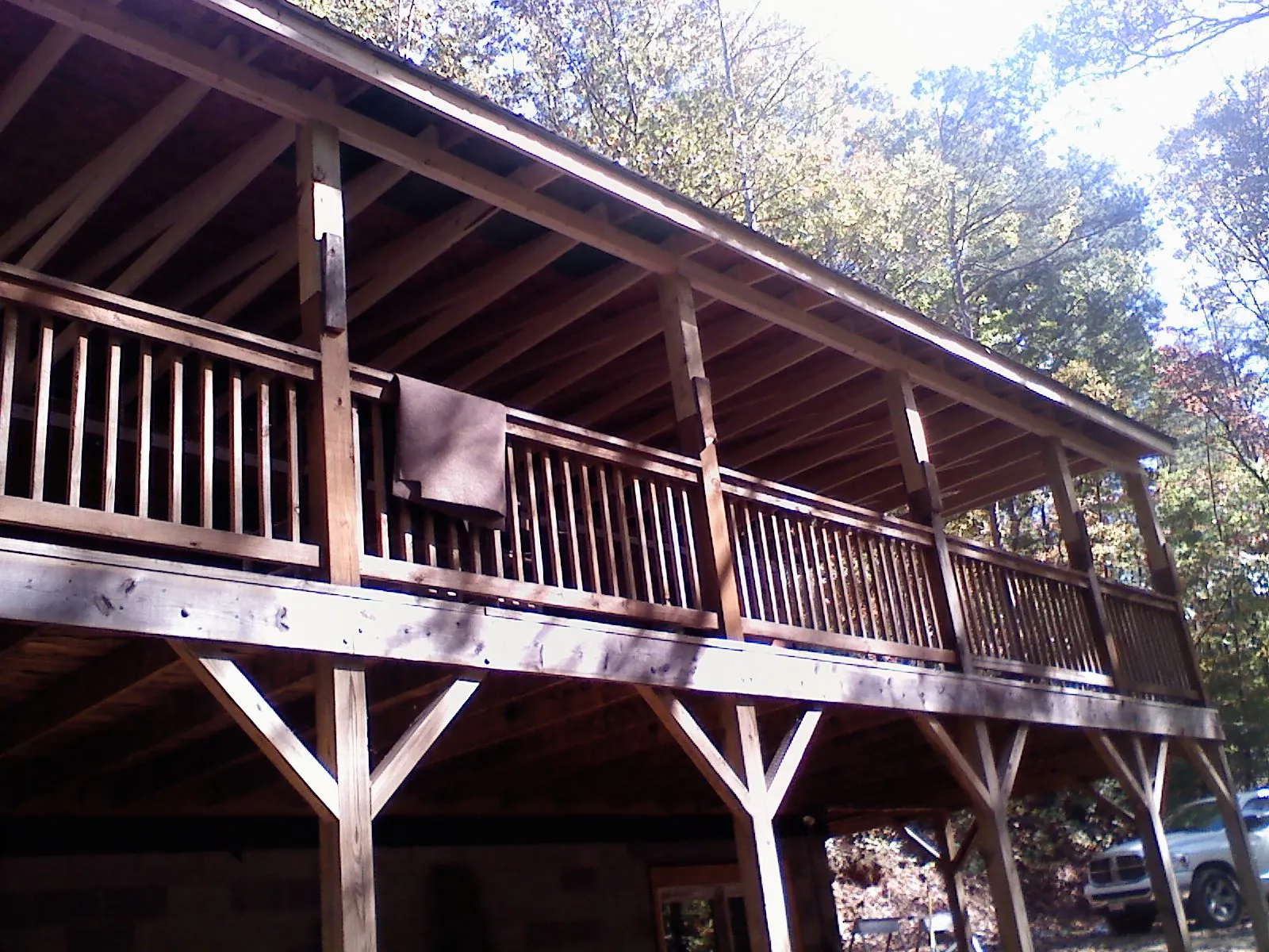Timber framing under a new elevated porch and deck — Roof Leak Repair in Barrington by Roofing Brothers